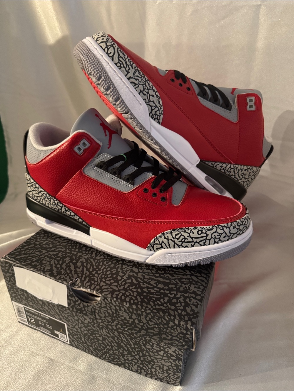 Nike Air Jordan 3 Retro SE "Unite" sneakers feature vibrant Varsity Red leather